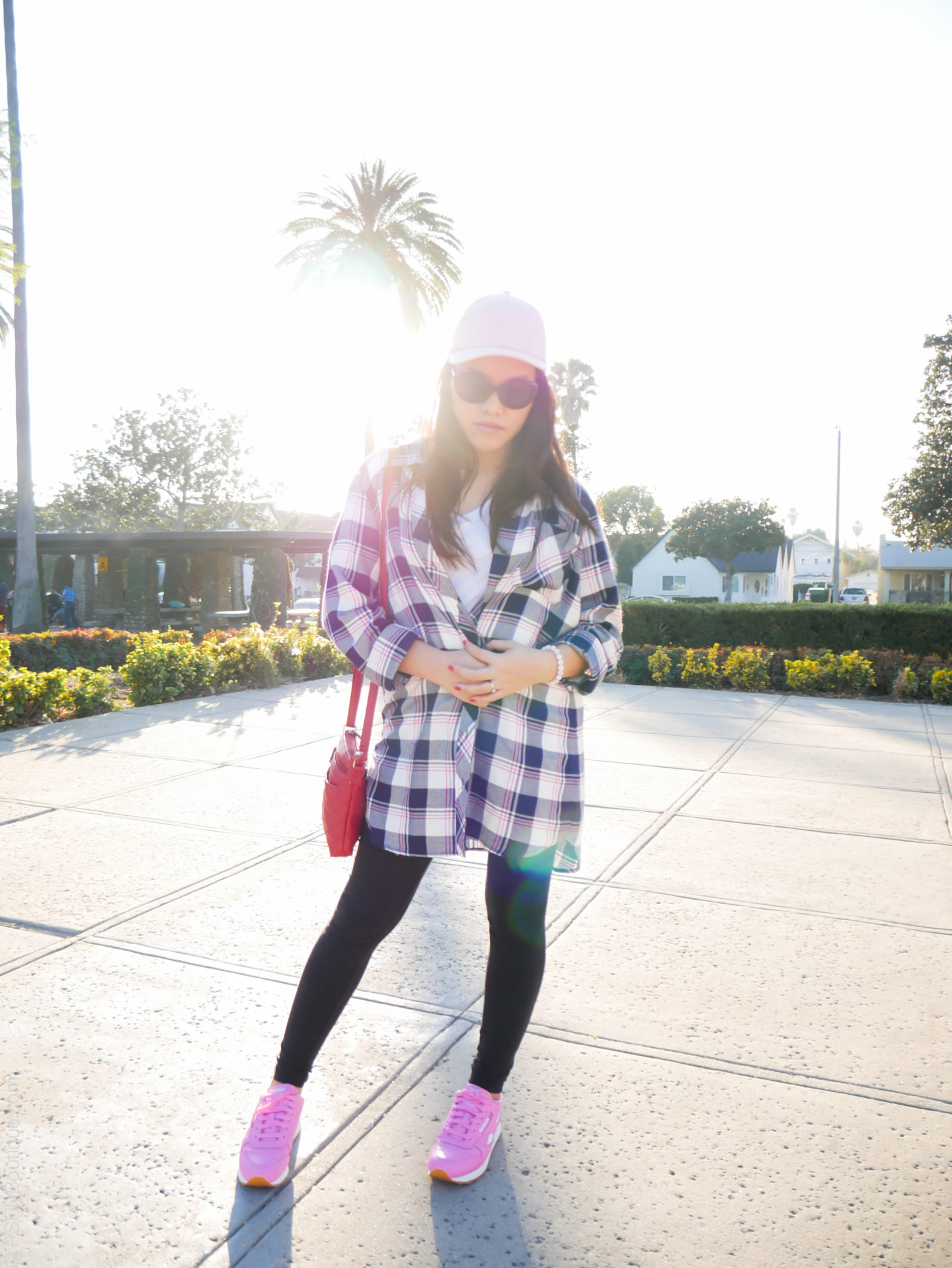 Instagram: @pslilyboutique, Pinterest, Los Angeles fashion blogger, top fashion blog, best fashion blog, fashion & personal style blog, travel blog, LA fashion blogger, Gone Plaid... | PSLily Boutique, winter 2018 outfit ideas, my style, KUT from the Kloth Nordstrom blue and white pink plaid shirt, pink H&M hat, pink leather Reebok classic sneakers shoes, park, palm trees, red small quilted crossbody bag