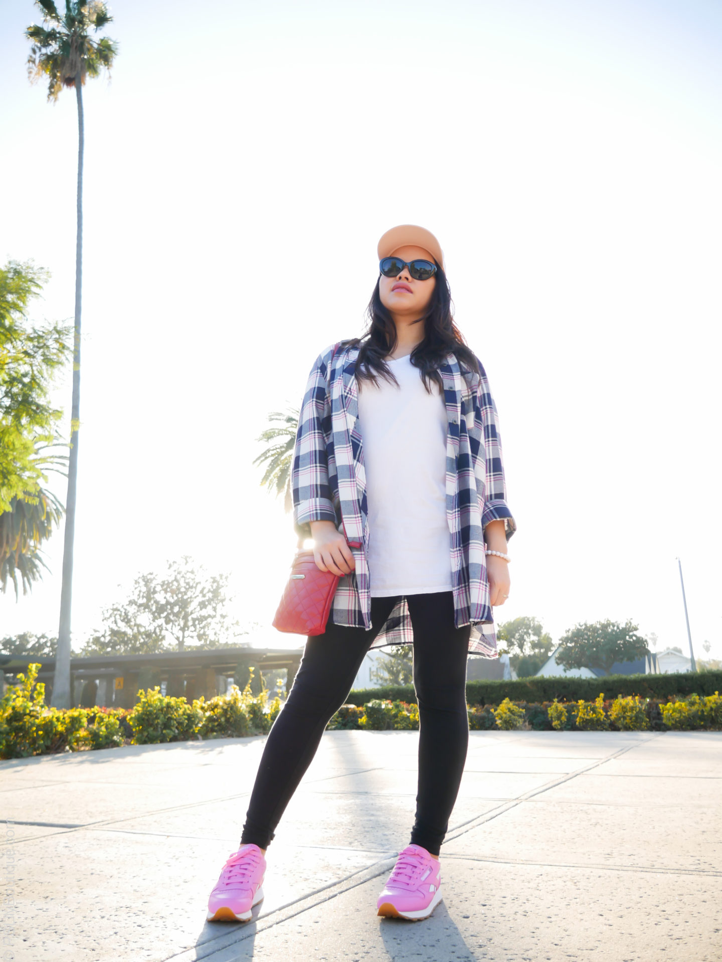 Gone Plaid... | PSLily Boutique, Pink leather Reebok classic sneakers shoes, Instagram: @pslilyboutique, Pinterest, Los Angeles fashion blogger, top fashion blog, best fashion blog, fashion & personal style blog, travel blog, LA fashion blogger, forever 21 black leggings, white tee, KUT from the Kloth blue and white plaid shirt, winter 2018 outfit ideas, pink H&M hat, Street fashion, casual, wiw, what i wore, 2.6.18 , palm trees, Tuesday, park