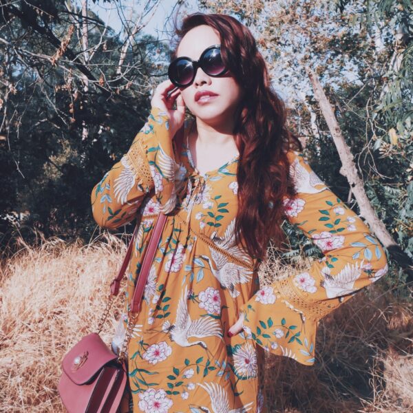 Like a bird... | PSLily Boutique Fashion Blog, Instagram: @pslilyboutique, Pinterest, Los Angeles fashion blogger, top fashion blog, best fashion blog, fashion & personal style blog, travel blog, travel blogger, LA fashion blogger, spring & summer 2018 outfit ideas, Marigold yellow crane bird & floral flower print bell sleeve Target dress, Bloomingdale’s long hair, round sunglasses, salmon pink Andrew Marc flower detail bag, make-up, colorescience sungscreen, Rimmel London heather shimmer lipstick, Cashmere Buff Lip plumper GrandeLips Grande Cosmetics, 7.20.18, Instagram: @pslilyboutique, Pinterest, Los Angeles fashion blogger, top fashion blog, best fashion blog, fashion & personal style blog, travel blog, lifestyle blogger, travel blogger, LA fashion blogger, chicago based fashion blogger, fashion influencer, luxury fashion, luxury travel, luxury influencer, luxury lifestyle, lifestyle blog, italian fashion, resort style, hawaii,