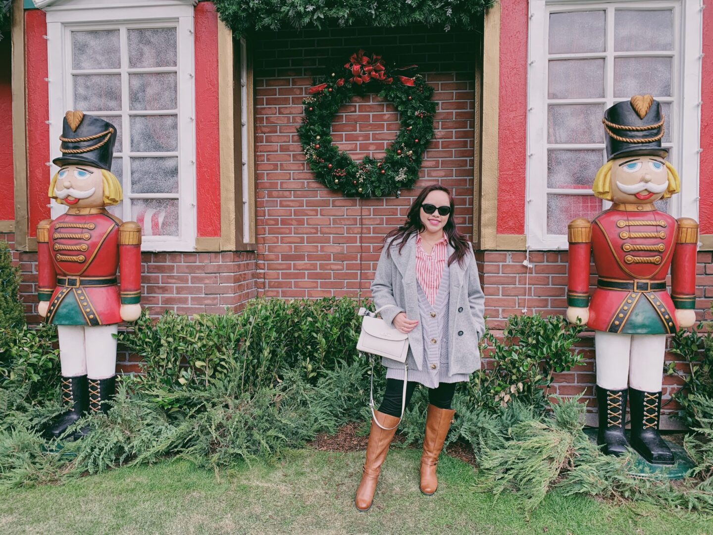 pslilyboutique-fashion-blog-christmas-decorations-wreath-heart's-desire-home-outdoor-space-nutcracker-statues-decor-Americana-at-Brand-Los-Angeles-Fashion-Blogger-Travel-Naturalizer-brown-knee-high-boots-winter-2019-outfit-ideas-12-5-19