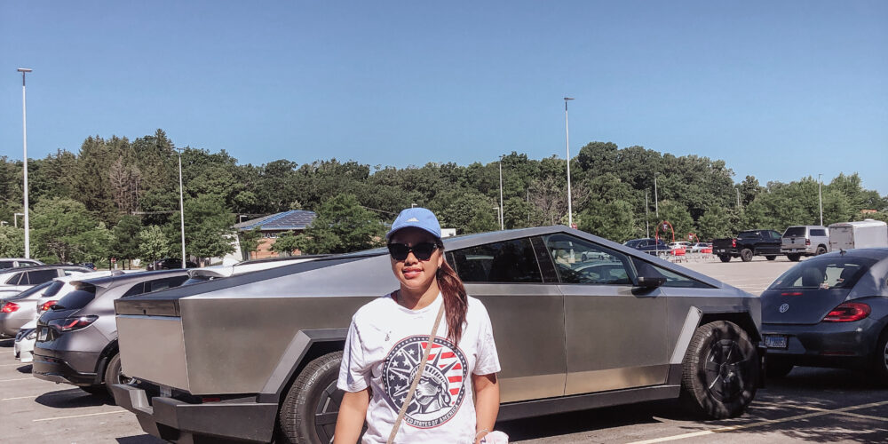 pslilyboutique-on-instagram-pinterest-runway-fashion-silver-tesla-cyber-truck-nike-black-legend-sneakers-summer-2025-outfit-ideas-adidas-blue-hat-tesla-silver-cyber-truck-IMG_3128