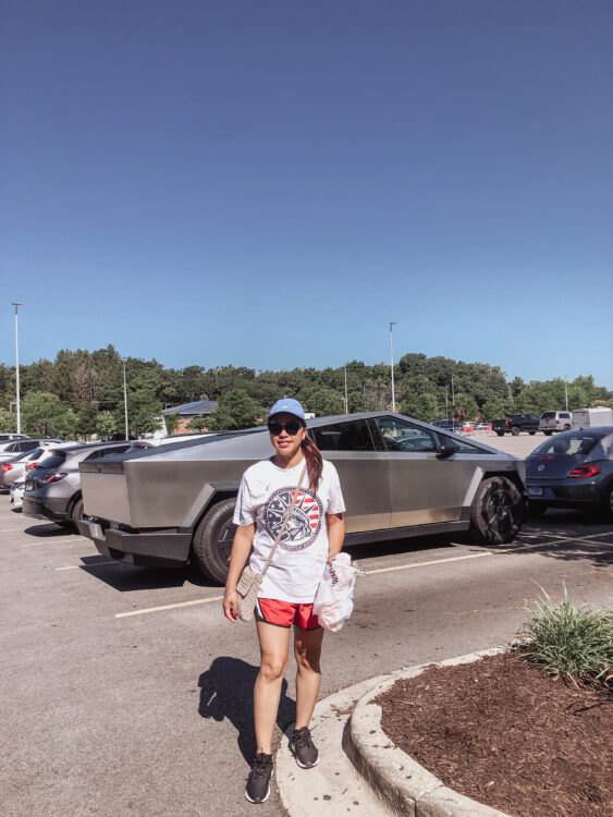 pslilyboutique-on-instagram-pinterest-runway-fashion-silver-tesla-cyber-truck-nike-black-legend-sneakers-summer-2025-outfit-ideas-adidas-blue-hat-tesla-silver-cyber-truck-IMG_3128