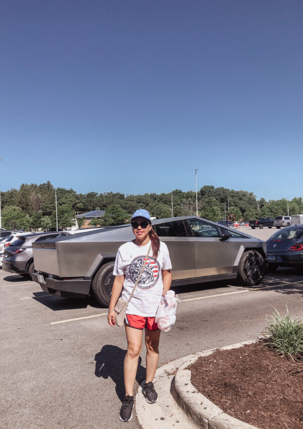 pslilyboutique-on-instagram-pinterest-runway-fashion-silver-tesla-cyber-truck-nike-black-legend-sneakers-summer-2025-outfit-ideas-adidas-blue-hat-tesla-silver-cyber-truck-IMG_3128